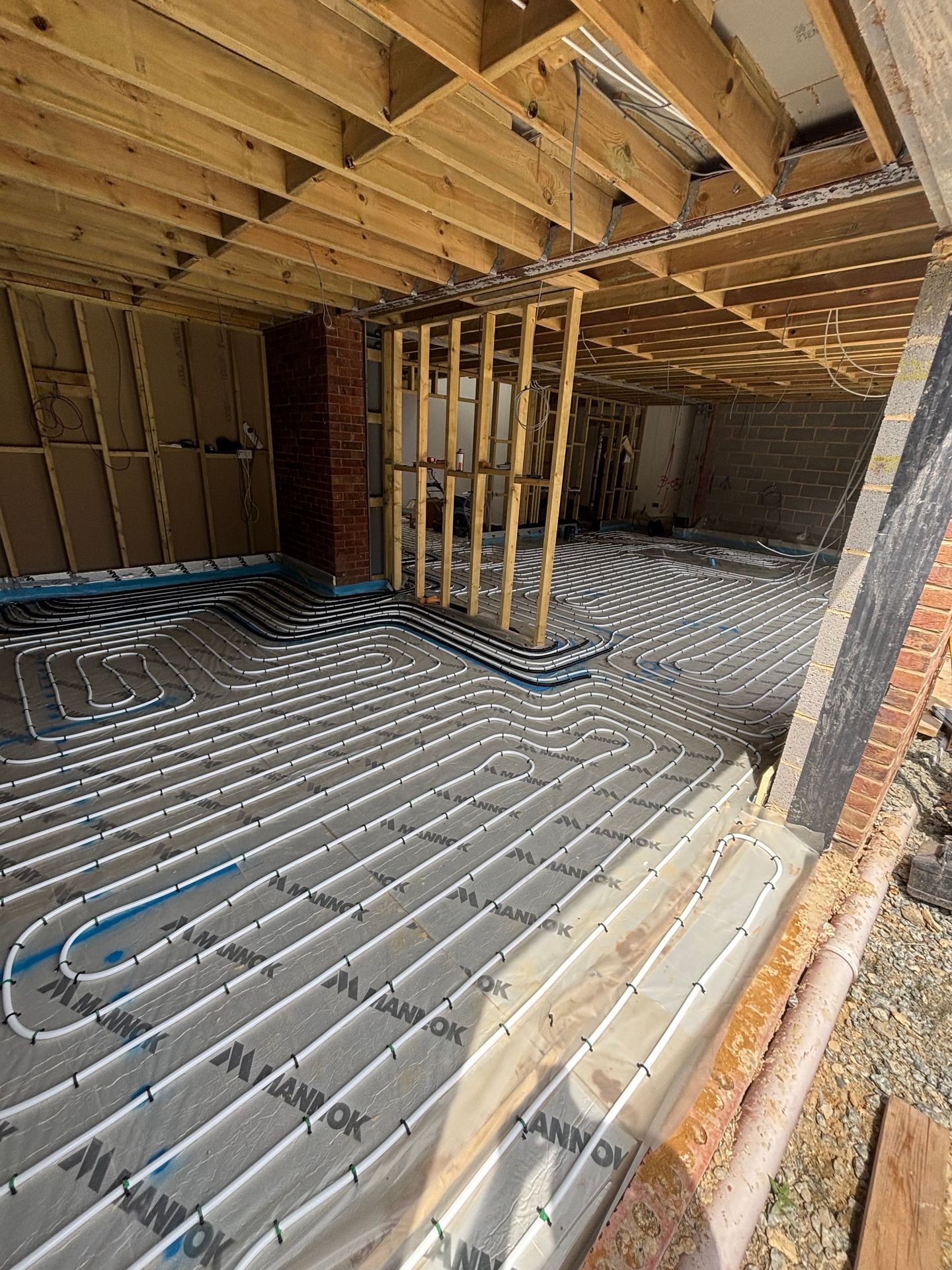 Underfloor heating pipe covering a full new build extension floor
