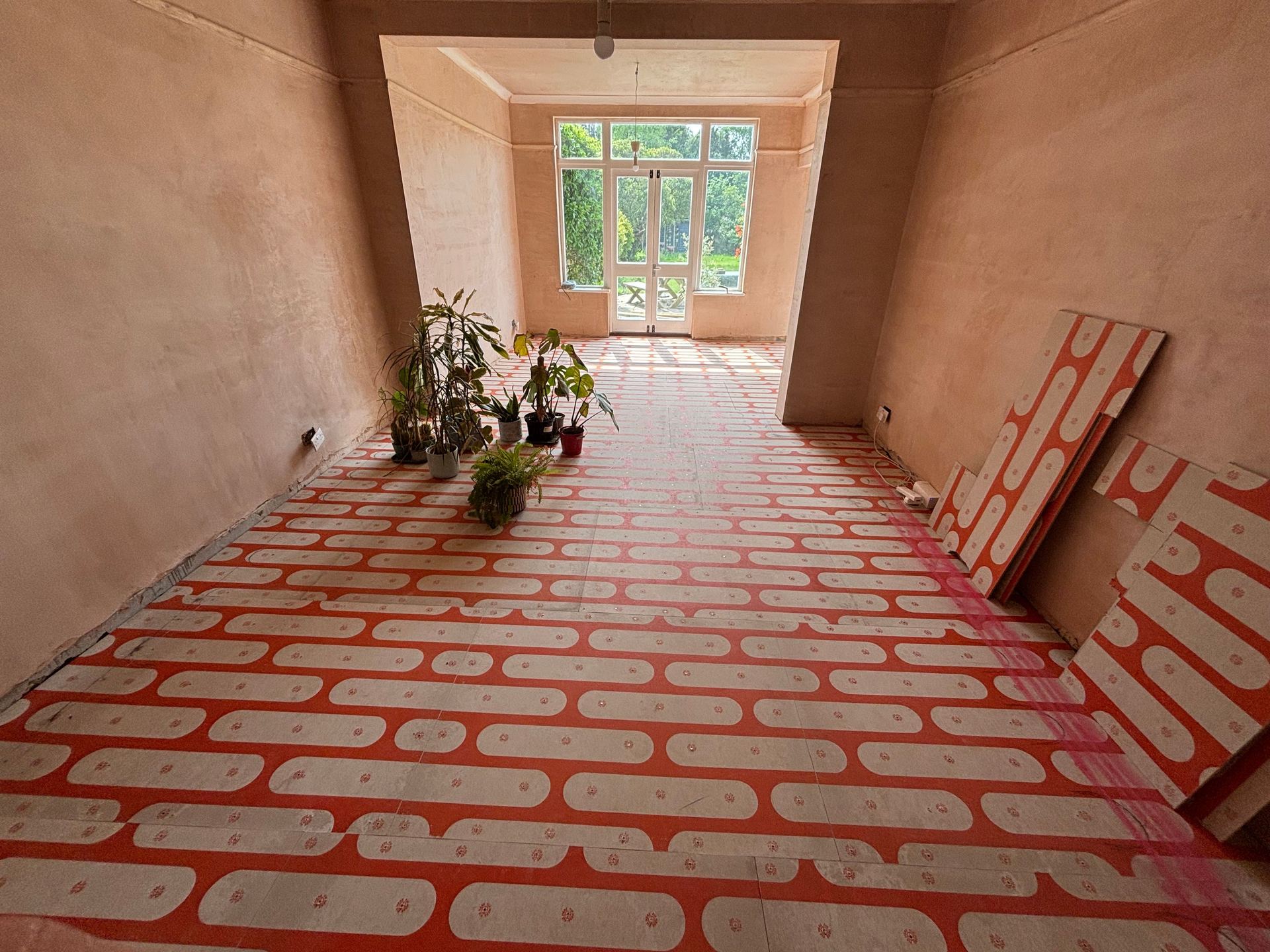 Structural chipboard heating panels laid across a full room