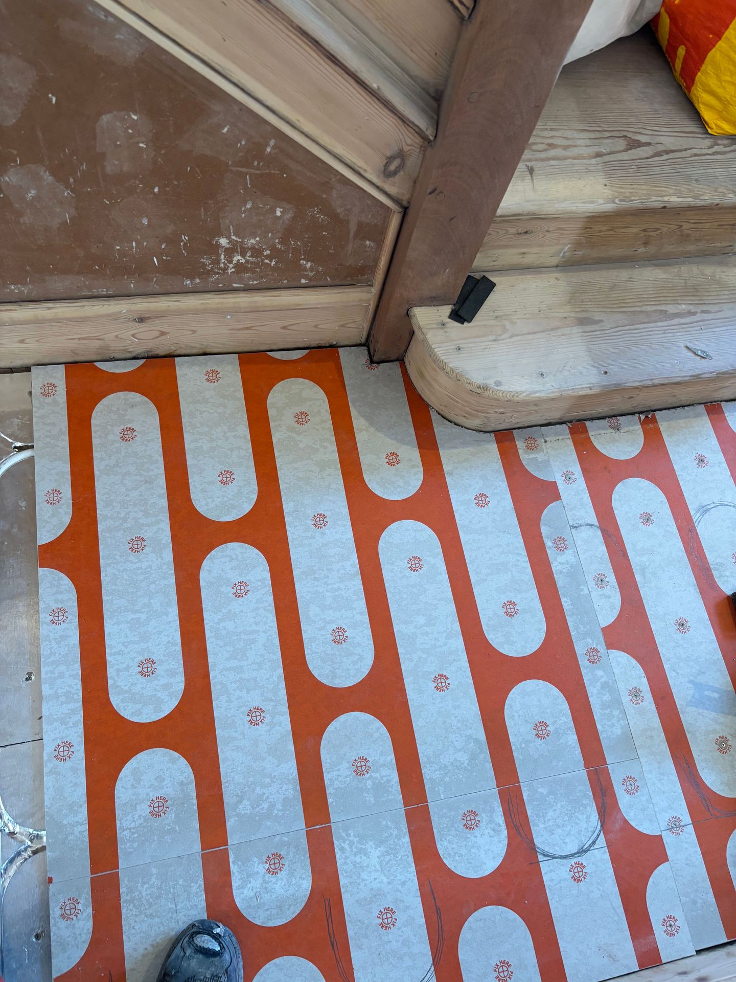 Heating deck cut in around a door frame and step