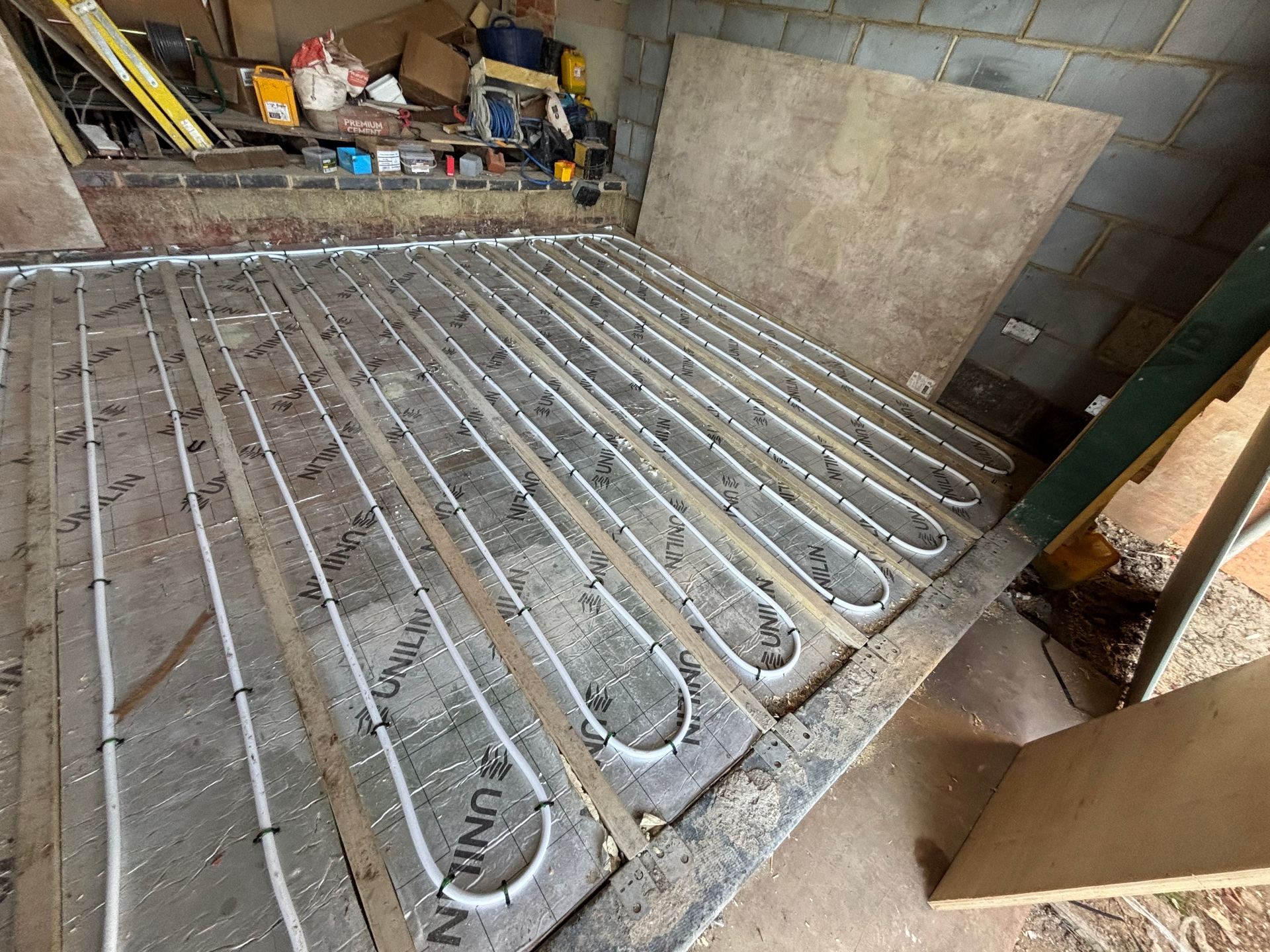 Suspended floor underfloor heating across a full room of joists